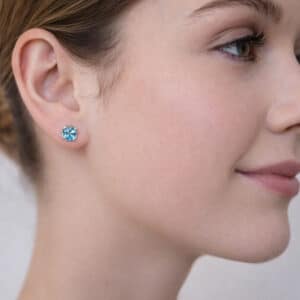 4mm genuine London Blue Topaz stud earrings in Sterling Silver or Gold