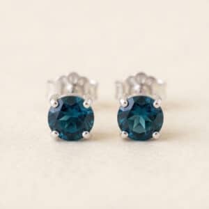 4mm genuine London Blue Topaz stud earrings in Sterling Silver or Gold